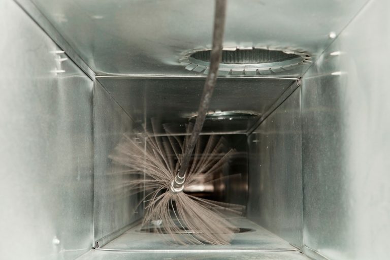 Air duct cleaning with rotating brush